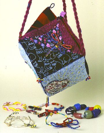 bag and bracelets by Laura Jullion